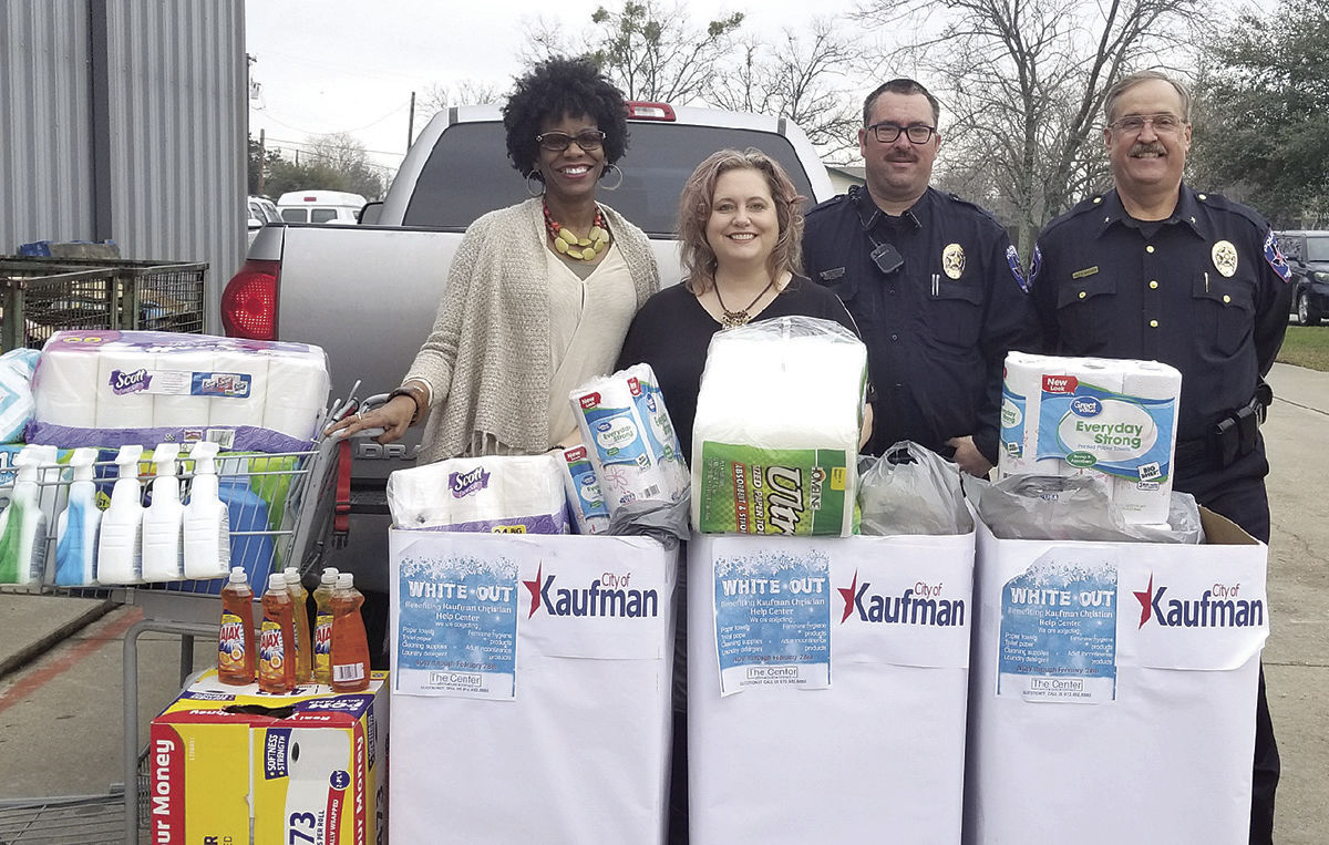 City staff collects goods for center